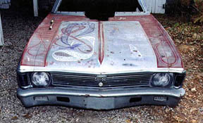 Yup, it's a real 69 Nova fiberglass body. Whoever painted that grille did a dandy job, right? It's prob'ly too old to save but I'm actually gonna try! FCs are s'posed to have a few nicks and scratches anyway, right? Plus, the history aspect makes me wanna save a wee bit of the old. This shot was taken at friend Carl Blanton's house in Asbury, MO. He owns Mo-Kan Dragway.